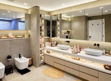 Modern luxury bathroom interior design with frameless glass shower and stylish tiles in a Dubai apartment