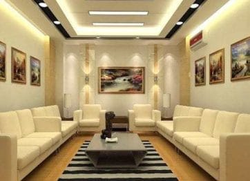 Modern minimalist gypsum false ceiling design with concealed LED strip lighting in a luxury Dubai office